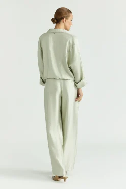 Glänzende Bundfaltenhose