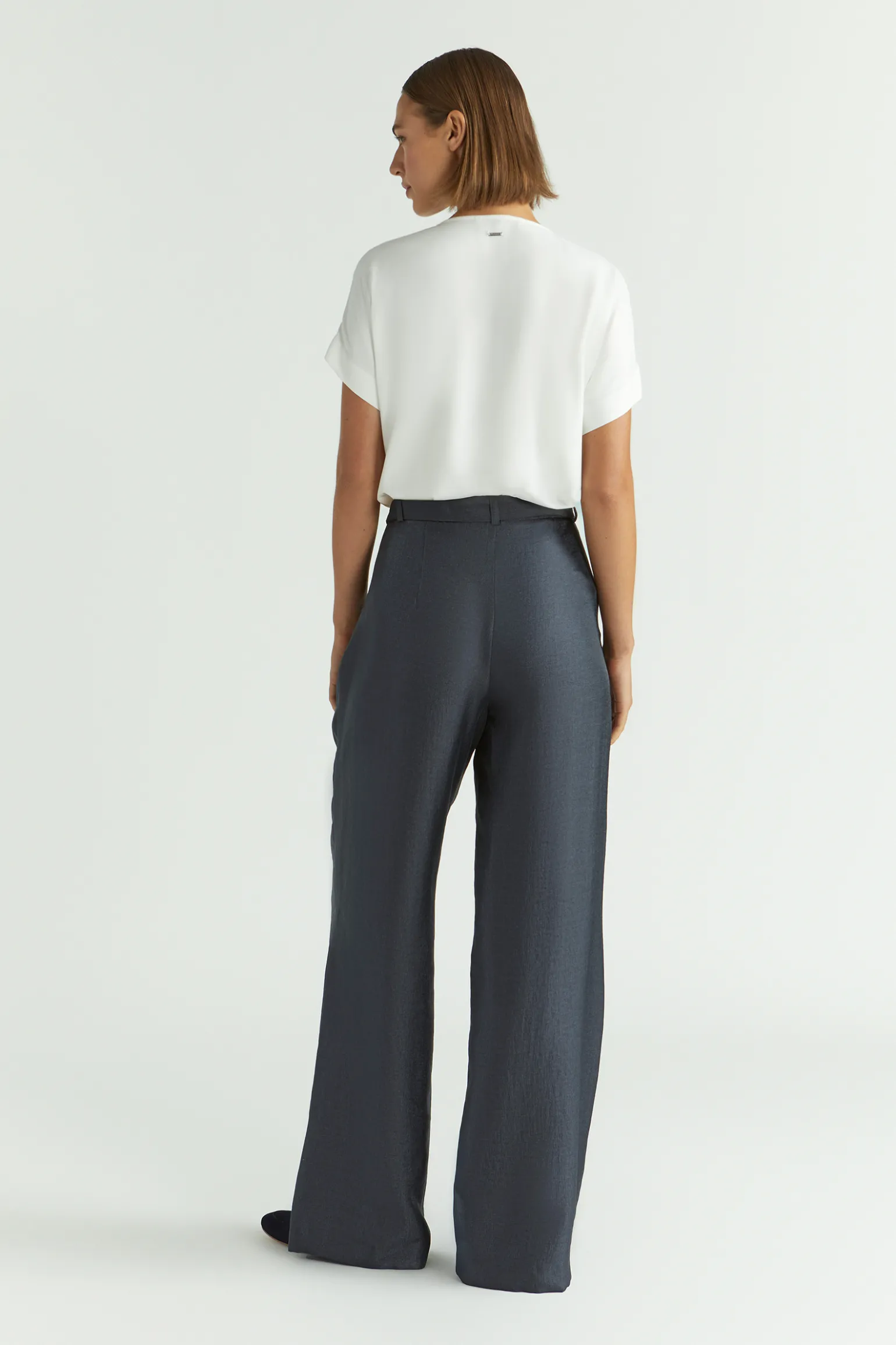 Glänzende Bundfaltenhose