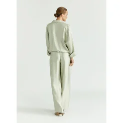 Glänzende Bundfaltenhose